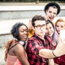 teenagers taking selfies
